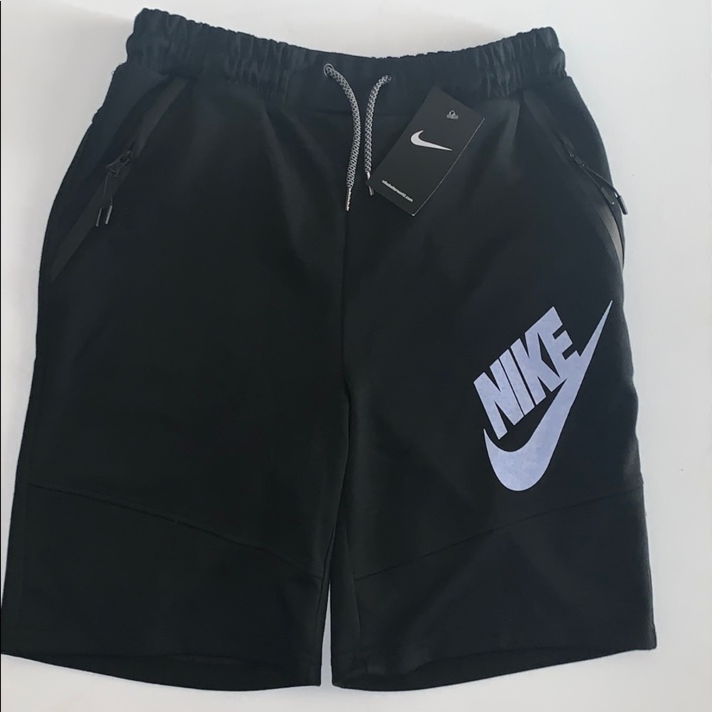 Nike shorts with zipper pockets.